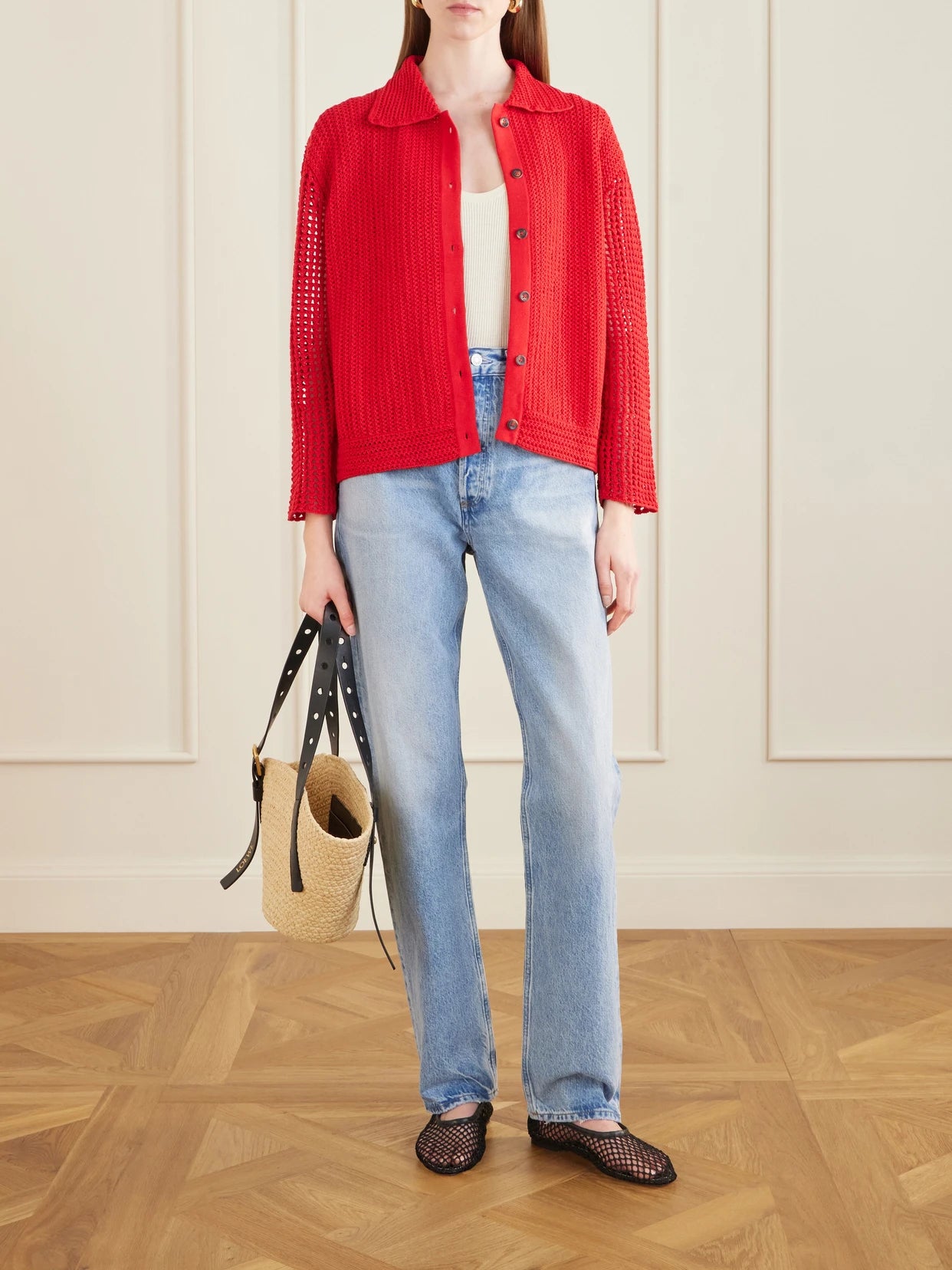 Image of a model wearing Outerwear. Product name - Solar Open-knit Cotton Cardigan in Red colour by brand - ESCVDO