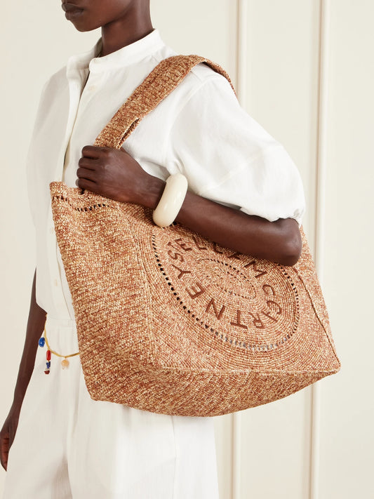 Image of Bags. Product name - Logo-embroidered Raffia Tote Bag in Beige colour by brand - Stella McCartney