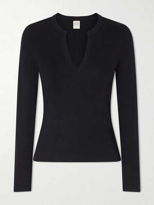 Image of a model wearing Tops. Product name - Iman Organic Cotton-jersey T-shirt in Black colour by brand - FLORE FLORE