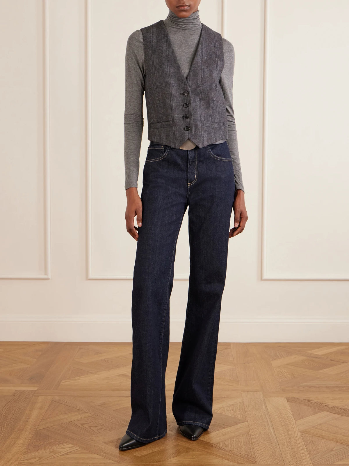 Image of a model wearing Tops. Product name - Keria Stretch-jersey Turtleneck Top in Dark gray, Ecru colour by brand - Nili Lotan