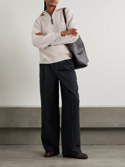 Image of a model wearing Outerwear. Product name - Bead-embellished Ribbed Cashmere Half-zip Sweater in Beige colour by brand - Brunello Cucinelli