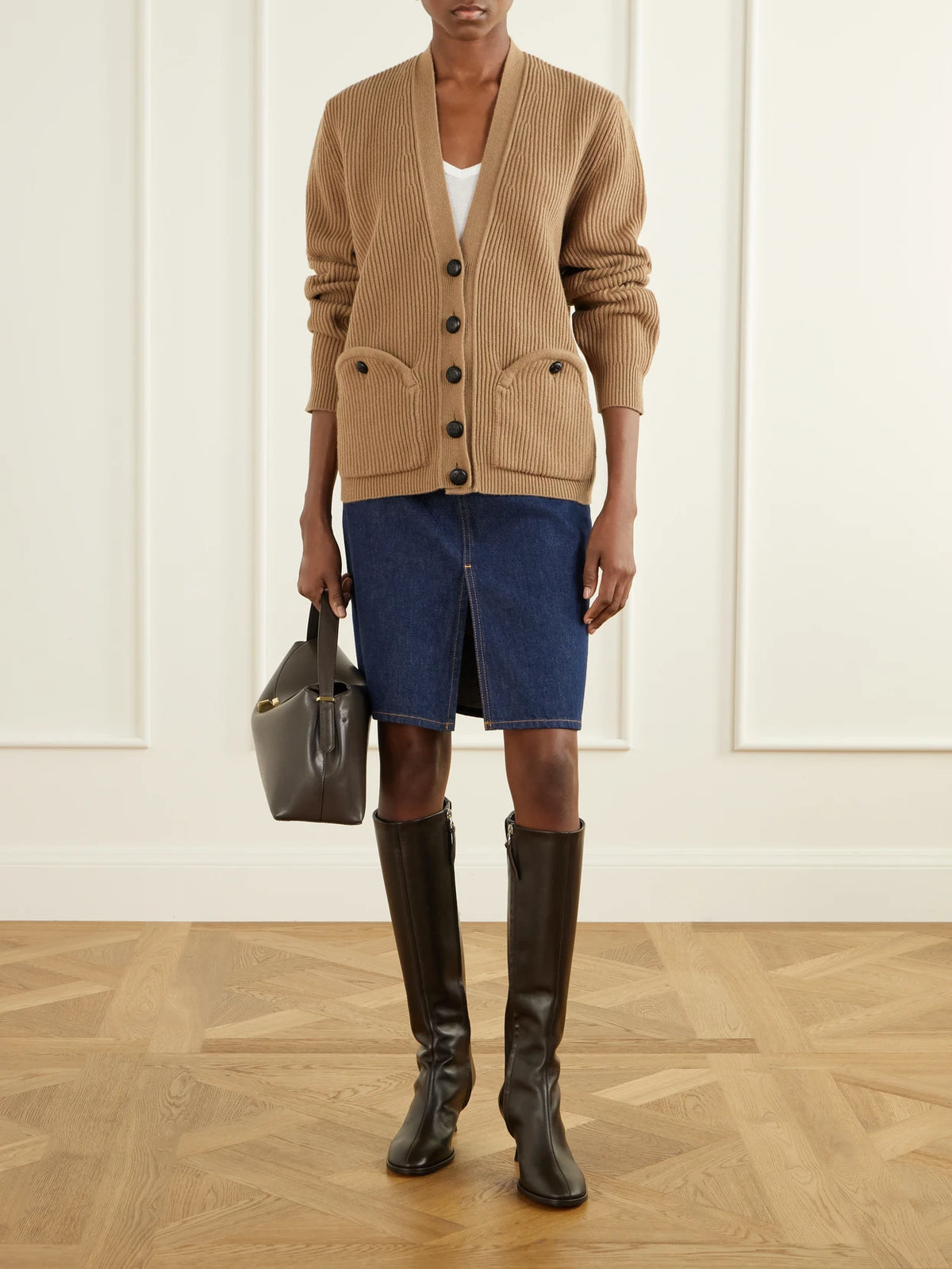 Image of a model wearing Outerwear. Product name - Highland Uda Ribbed Wool And Cashmere-blend Cardigan in Camel colour by brand - BLAZÉ Milano