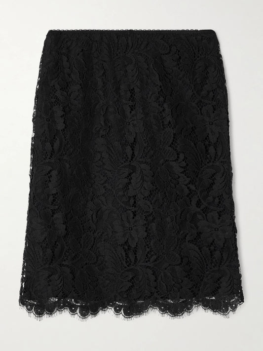 Image of a model wearing Skirts. Product name - Cotton-blend Lace Midi Skirt in Black colour by brand - Chloé
