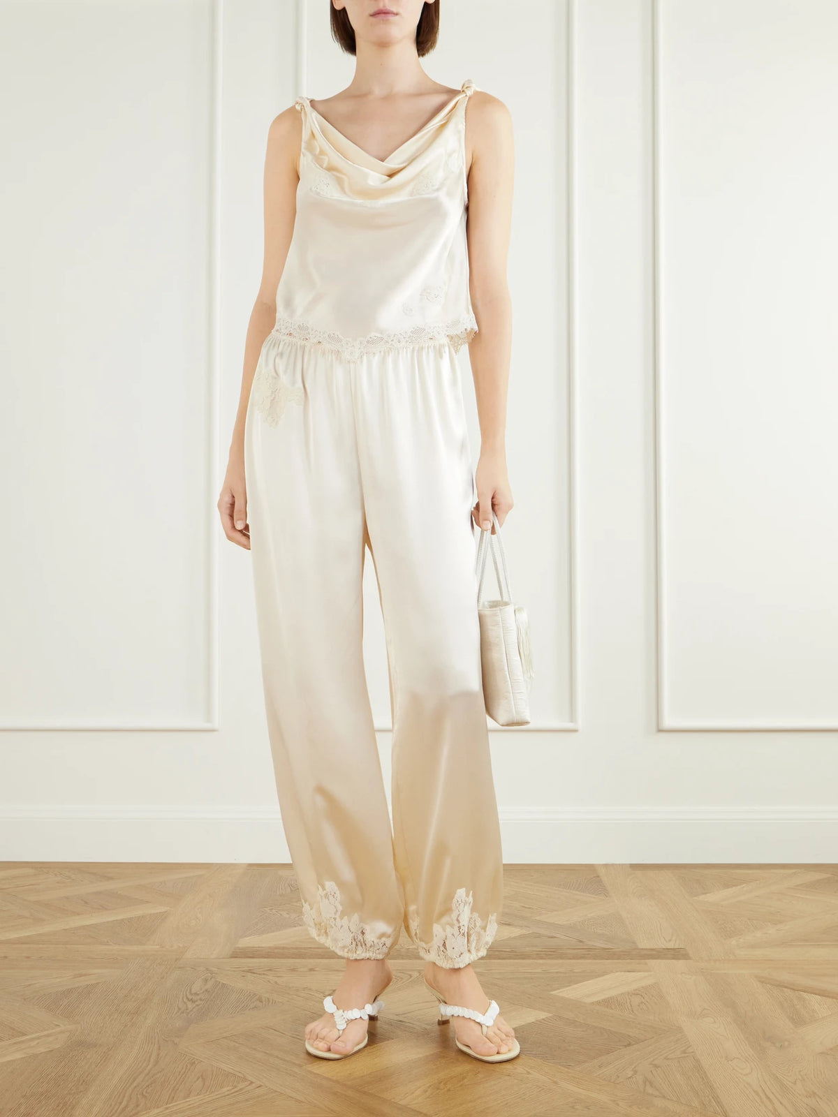 Image of Outfit Sets. Product name - Yaria Tapered Silk Satin Pants in Cream colour by brand - DÔEN