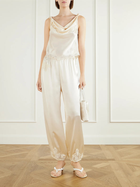 Image of Outfit Sets. Product name - Yaria Tapered Silk Satin Pants in Cream colour by brand - DÔEN