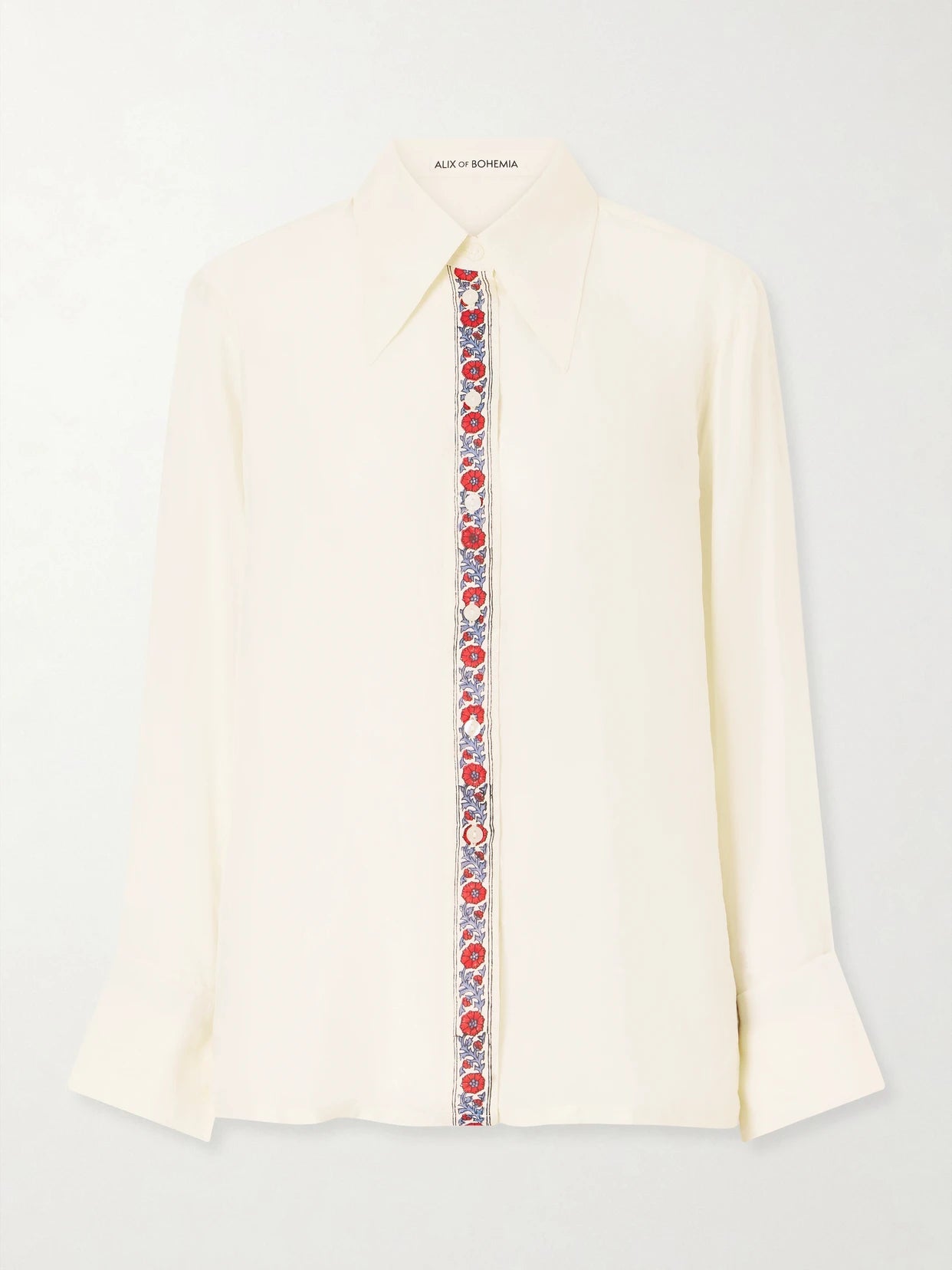 Image of a model wearing Tops. Product name - Dana Floral-print Silk-satin Shirt in Off-white colour by brand - ALIX OF BOHEMIA