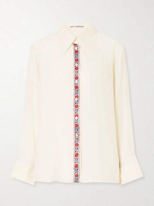 Image of a model wearing Tops. Product name - Dana Floral-print Silk-satin Shirt in Off-white colour by brand - ALIX OF BOHEMIA