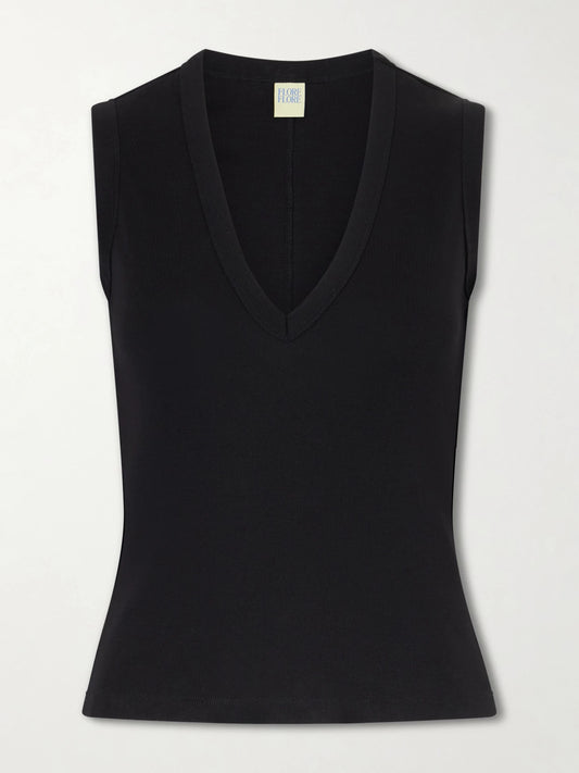 Image of a model wearing Tops. Product name - Dewi Organic Cotton-jersey Tank in Black colour by brand - FLORE FLORE