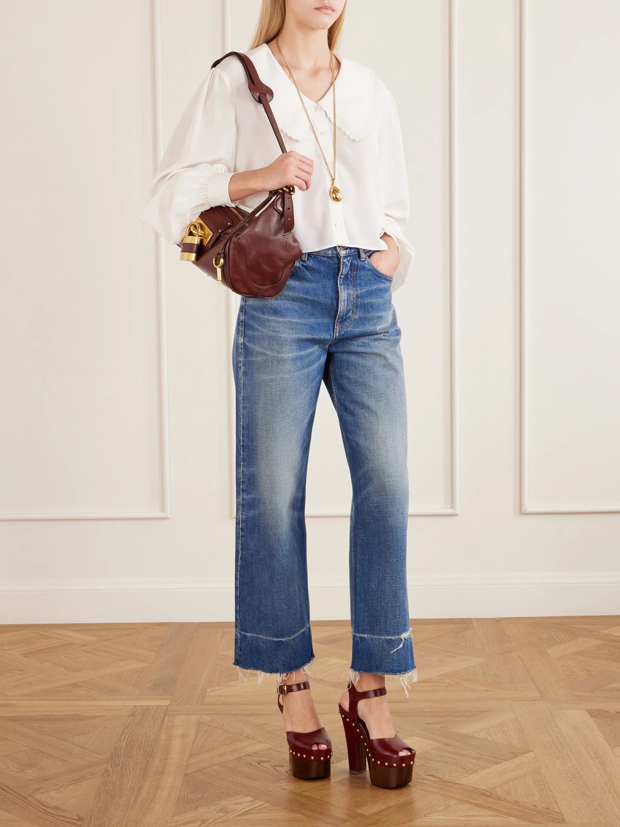 Image of a model wearing Tops. Product name - Cropped Silk-crepe De Chine Blouse in White colour by brand - Chloé