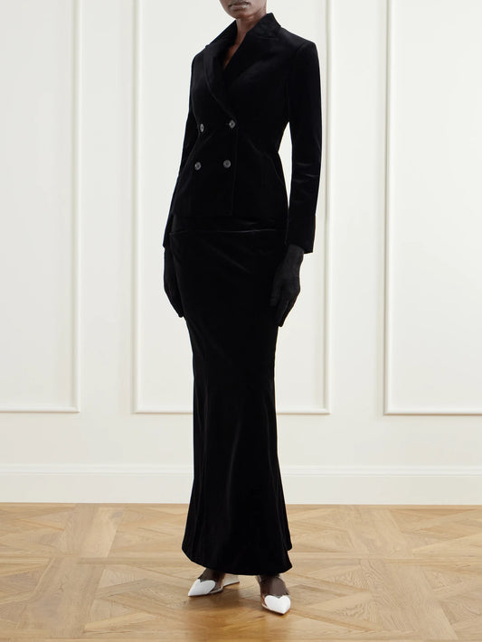 Image of a model wearing Skirts. Product name - Cotton-velvet Midi Skirt in Black colour by brand - Alaïa
