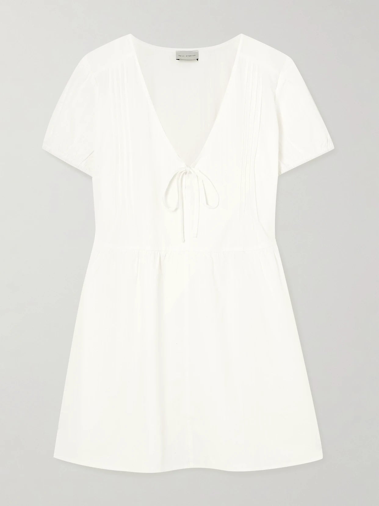 Image of Dresses. Product name - Pintucked Tie-detailed Organic Cotton Mini Dress in White colour by brand - Deiji Studios