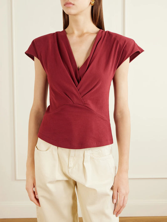 Image of a model wearing Tops. Product name - Nadrine Draped Cotton-jersey T-shirt in Burgundy colour by brand - ISABEL MARANT