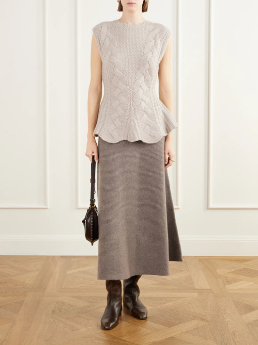 Image of a model wearing Outerwear. Product name - Signy Cable-knit Cashmere Top in Beige colour by brand - LISA YANG