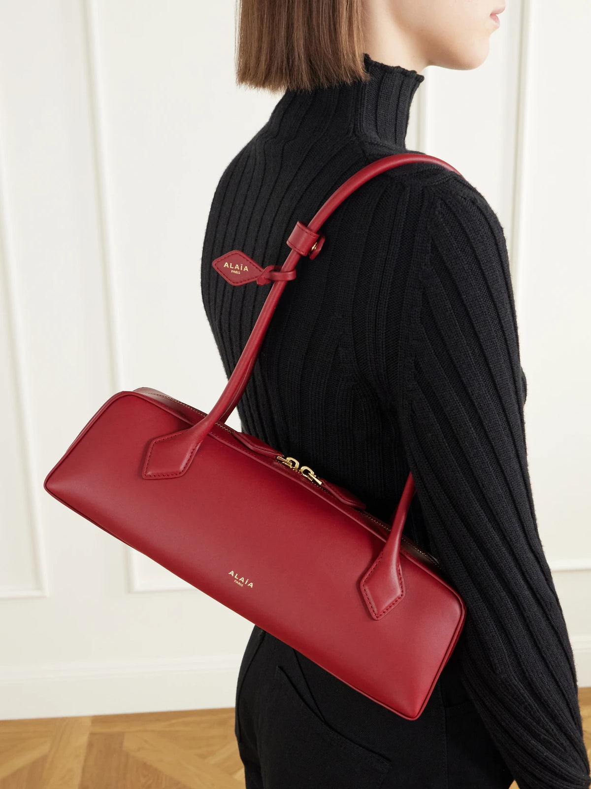 Image of Bags. Product name - Le Teckel Medium Leather Shoulder Bag in Red colour by brand - Alaïa