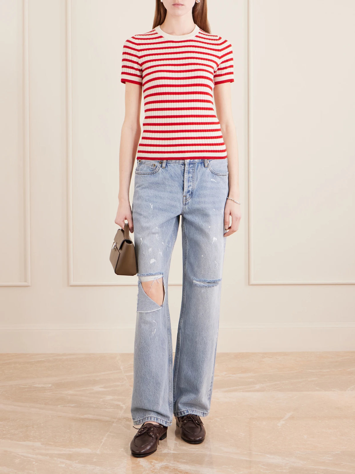 Image of a model wearing Tops. Product name - Alita Striped Cashmere T-shirt in Red colour by brand - Nili Lotan