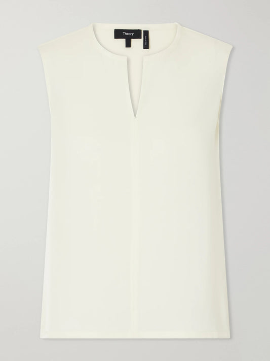 Image of a model wearing Tops. Product name - Cady Blouse in Pastel yellow colour by brand - Theory