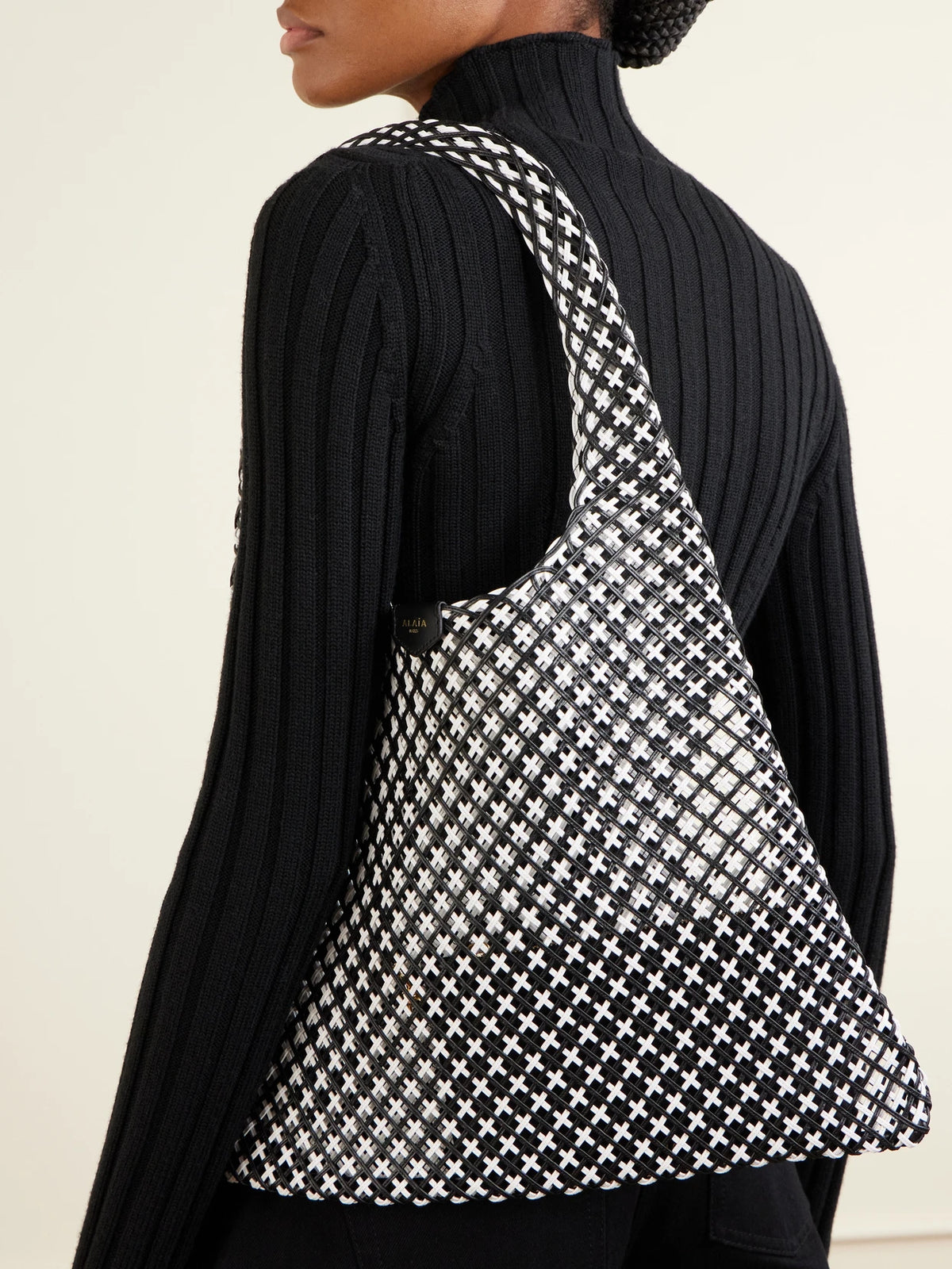 Image of Bags. Product name - Woven Leather Hobo Shoulder Bag in Black colour by brand - Alaïa