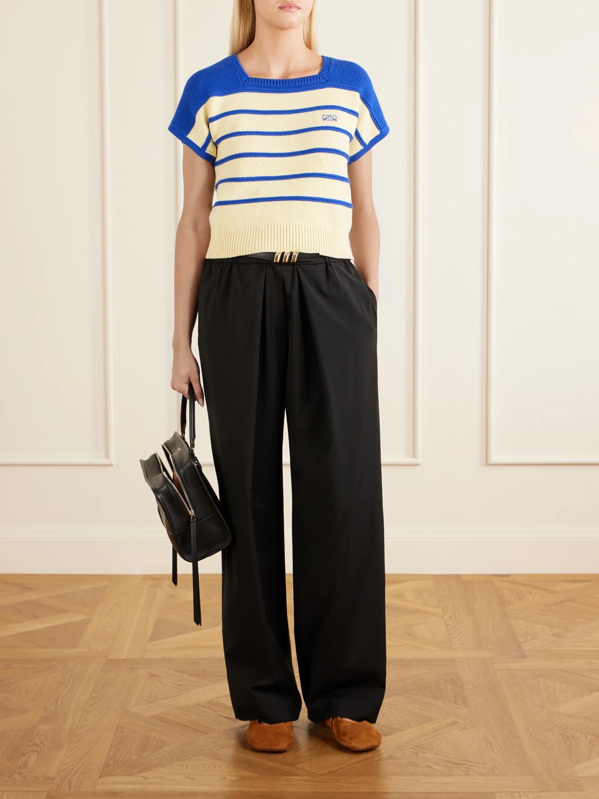 Image of a model wearing Outerwear. Product name - Anagram-embroidered Striped Cotton And Wool-blend Sweater in Yellow colour by brand - LOEWE