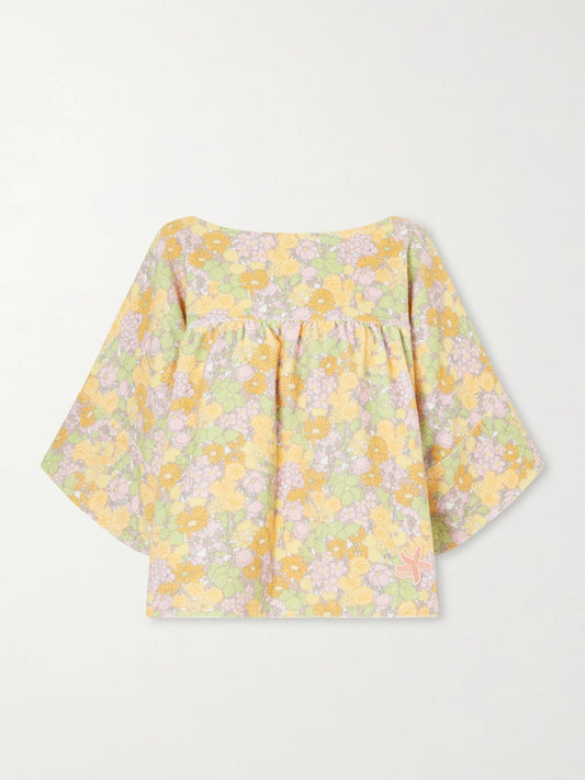 Image of a model wearing Outerwear. Product name - Flower-print Cotton Tunic in Yellow colour by brand - Chloé