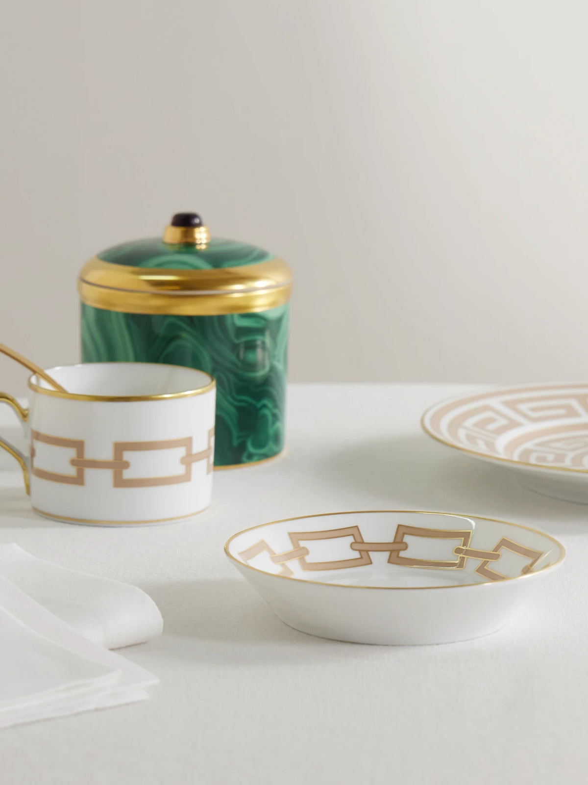 Image of Tableware. Product name - Catene Gold-plated Porcelain Tea Saucer in White colour by brand - GINORI 1735
