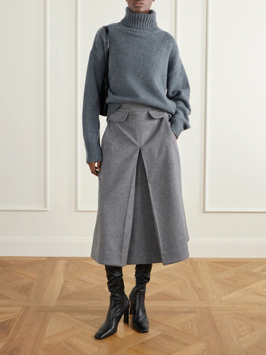 Image of a model wearing Skirts. Product name - Pleated Wool And Cashmere-blend Midi Skirt in Dark gray colour by brand - Co