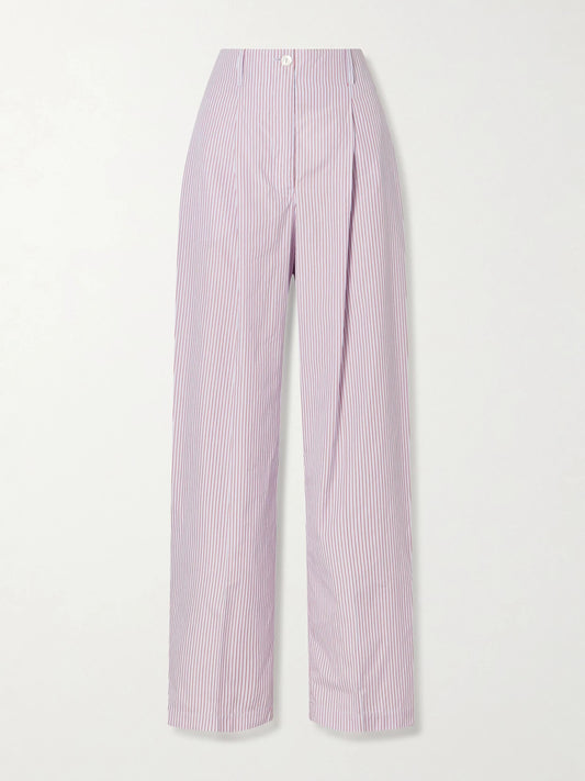 Image of a model wearing Pants. Product name - Dean Pleated Striped Organic Cotton-poplin Wide-leg Pants in Purple colour by brand - RÙADH