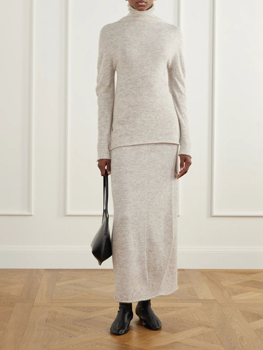 Image of a model wearing Skirts. Product name - Bottle Alpaca-blend Midi Skirt in Beige, Black colour by brand - Lauren Manoogian