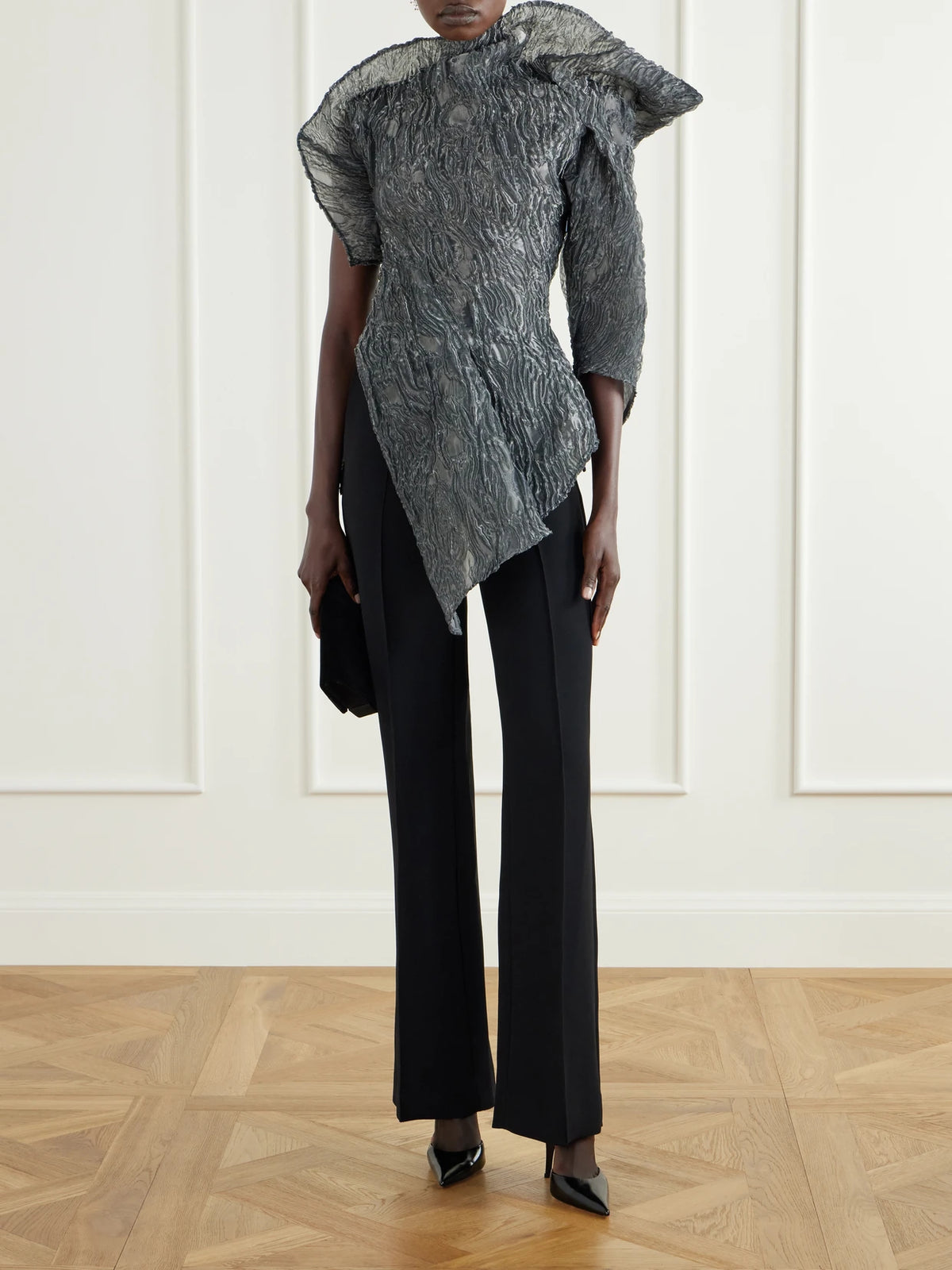 Image of a model wearing Tops. Product name - Scintilla Asymmetric Crinkled-georgette Blouse in Gray colour by brand - Maticevski