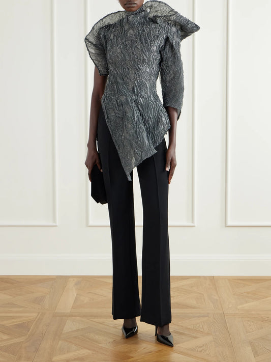 Image of a model wearing Tops. Product name - Scintilla Asymmetric Crinkled-georgette Blouse in Gray colour by brand - Maticevski