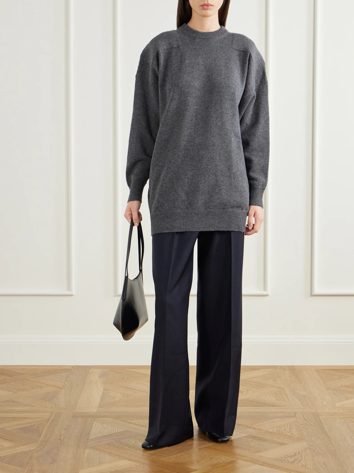 Image of a model wearing Outerwear. Product name - Padded Wool-blend Sweater in Gray colour by brand - Jil Sander