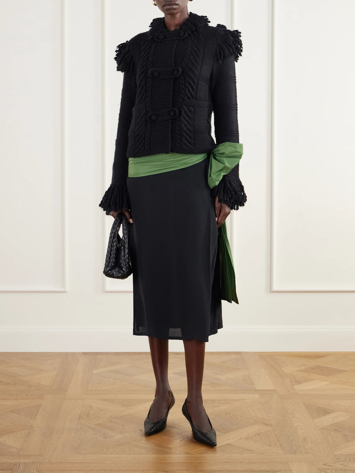 Image of a model wearing Outerwear. Product name - Fringed Cable-knit Wool Cardigan in Black colour by brand - Polo Ralph Lauren
