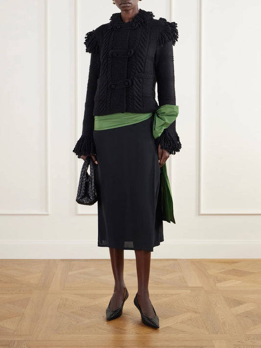 Image of a model wearing Outerwear. Product name - Fringed Cable-knit Wool Cardigan in Black colour by brand - Polo Ralph Lauren