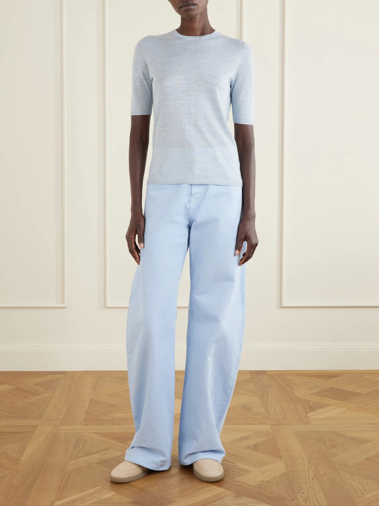 Image of a model wearing Outerwear. Product name - Chryse Cashmere, Silk And Hemp-blend Sweater in Sky blue colour by brand - Gabriela Hearst