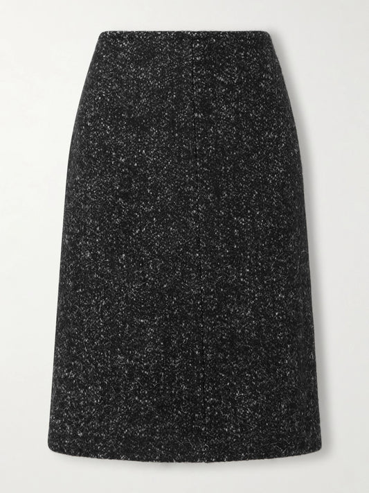 Image of a model wearing Skirts. Product name - Malva Wool Skirt in Charcoal colour by brand - The Row