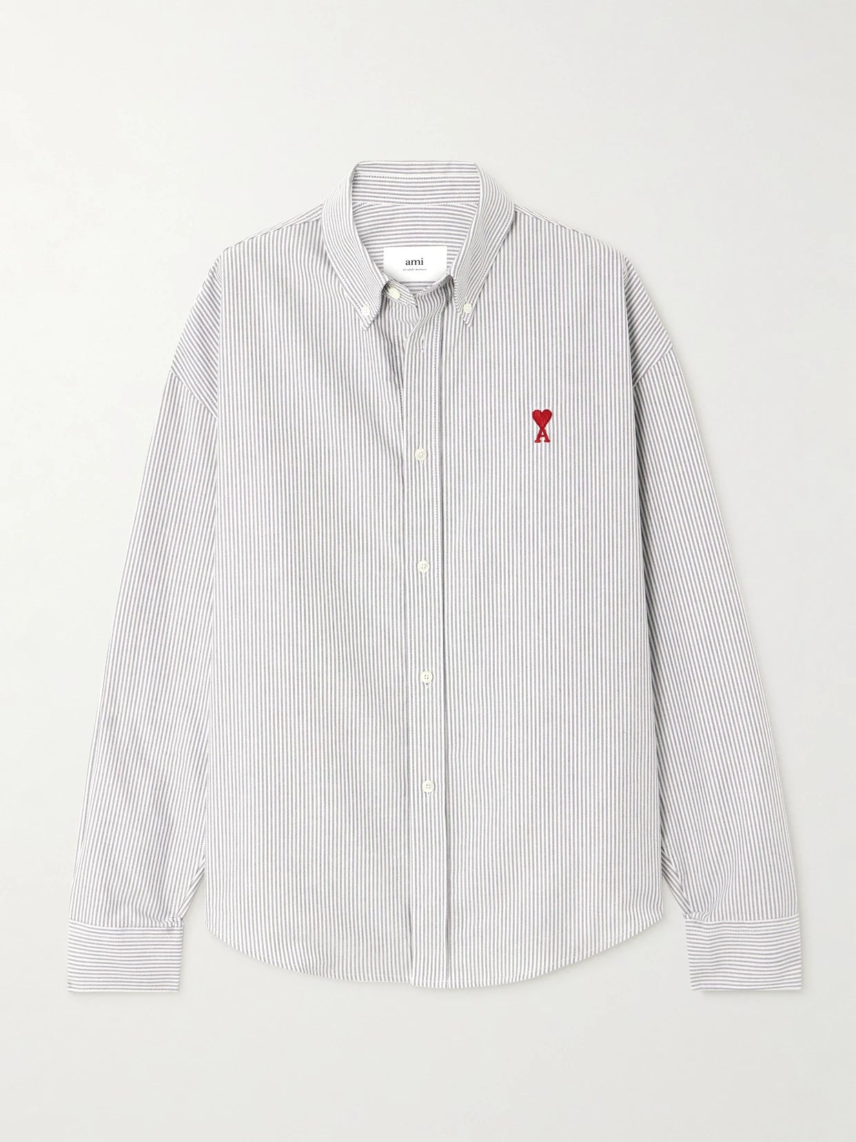 Image of a model wearing Tops. Product name - Adc Embroidered Striped Cotton-poplin Shirt in White colour by brand - AMI PARIS