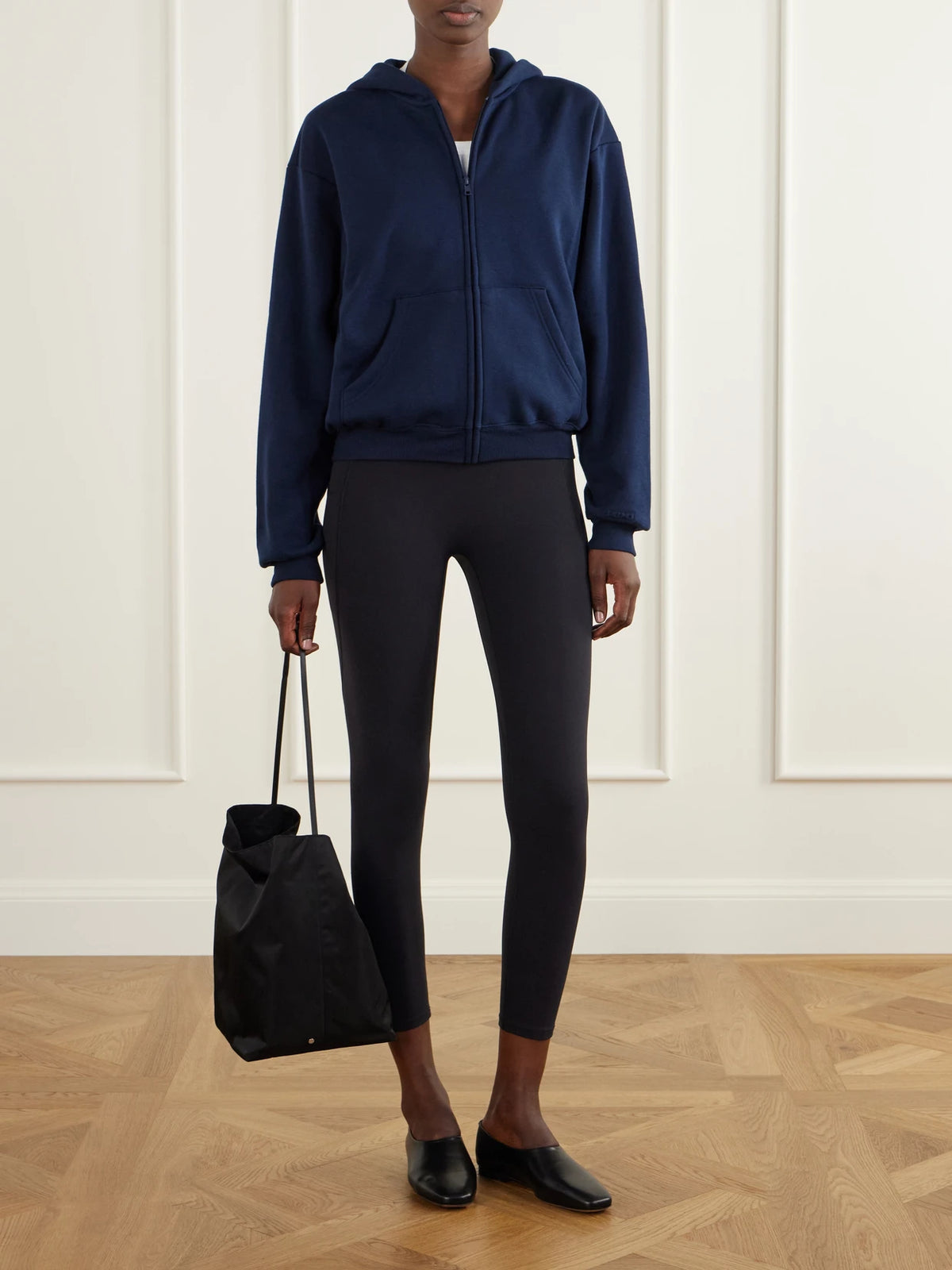 Image of Sleepwear & Loungewear. Product name - Hooded Cotton-blend Fleece Zip-up Sweatshirt in Navy colour by brand - SKIMS