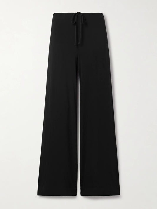 Image of a model wearing Pants. Product name - Adriel Stretch-jersey Wide-leg Pants in Black colour by brand - Nili Lotan