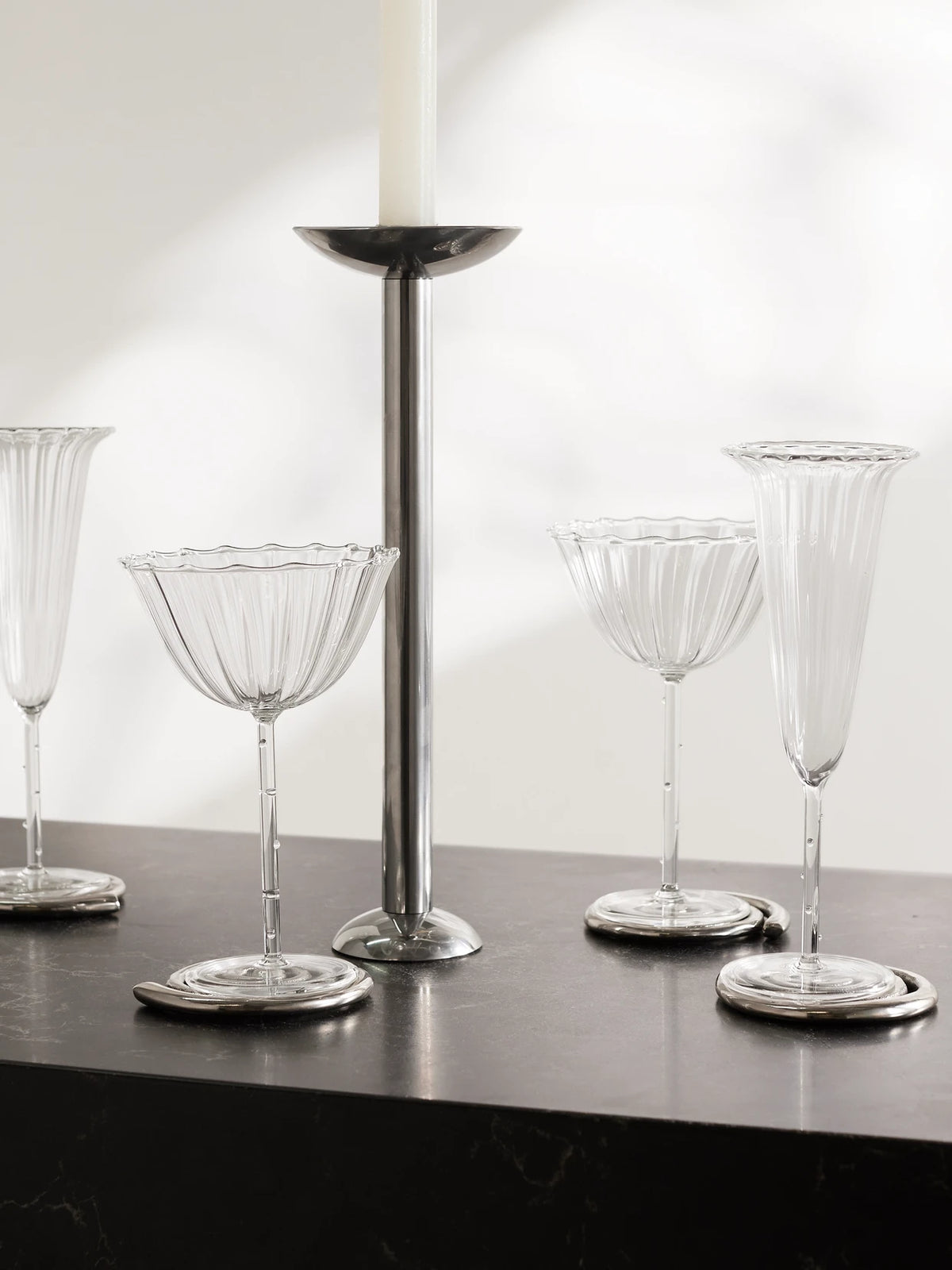 Image of Tableware. Product name - Cosmo Set Of Four Fluted Glass Champagne Coupes in Clear colour by brand - Sophie Lou Jacobsen