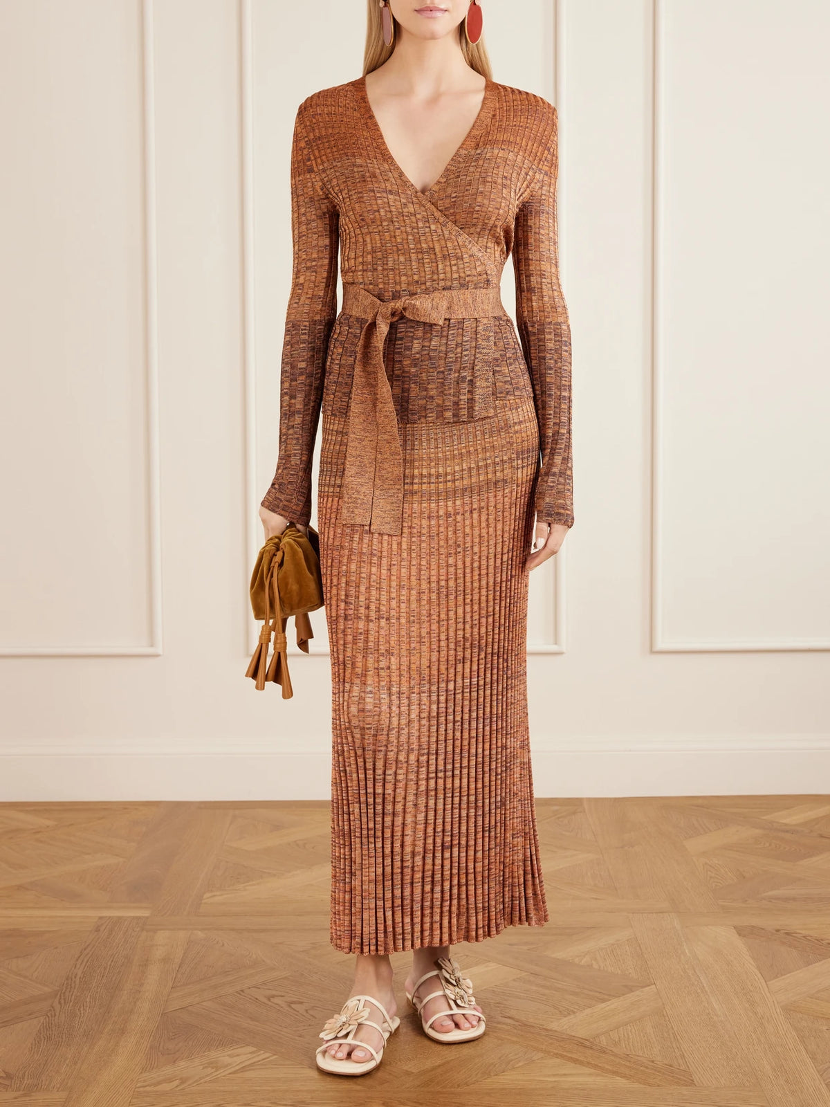 Image of a model wearing Skirts. Product name - Mouline Ribbed-knit Midi Skirt in Chocolate colour by brand - Zimmermann