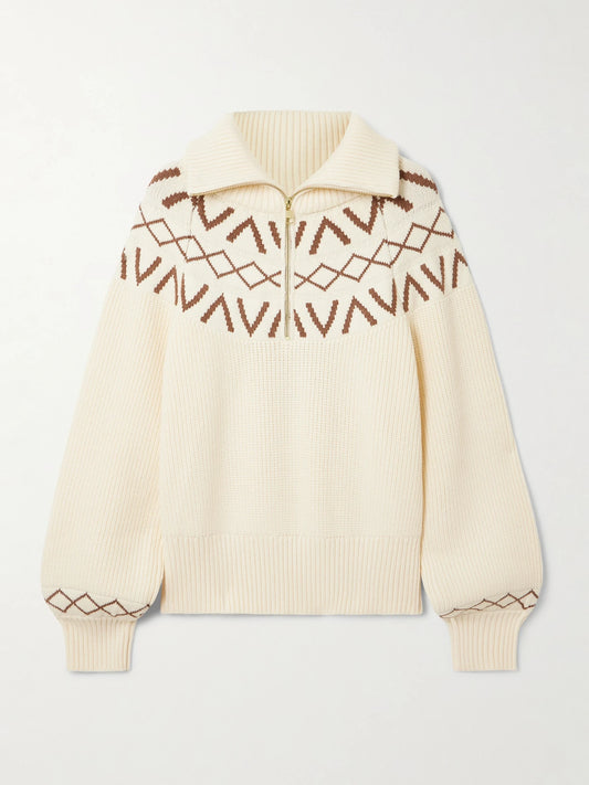 Image of a model wearing Outerwear. Product name - Sigrid Fair Isle Knitted Half-zip Sweater in Cream colour by brand - Varley