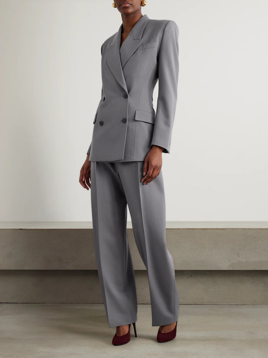 Image of a model wearing Pants. Product name - Capri Pleated Wool-gabardine Straight-leg Pants in Gray colour by brand - Alaïa
