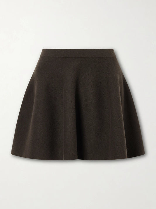 Image of a model wearing Skirts. Product name - Wren Cashmere Knit Mini Skirt in Brown colour by brand - LISA YANG