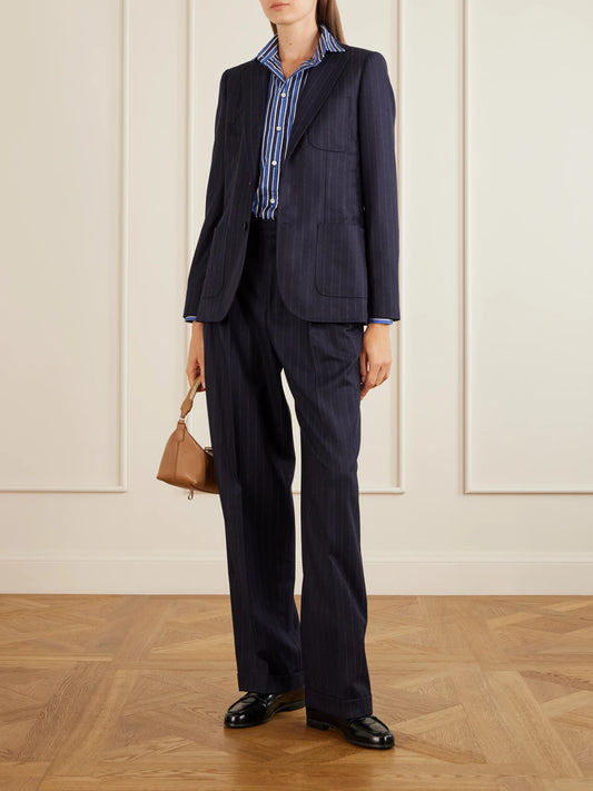 Image of a model wearing Pants. Product name - Pinstriped Fresco-wool Straight-leg Pants in Navy colour by brand - Polo Ralph Lauren