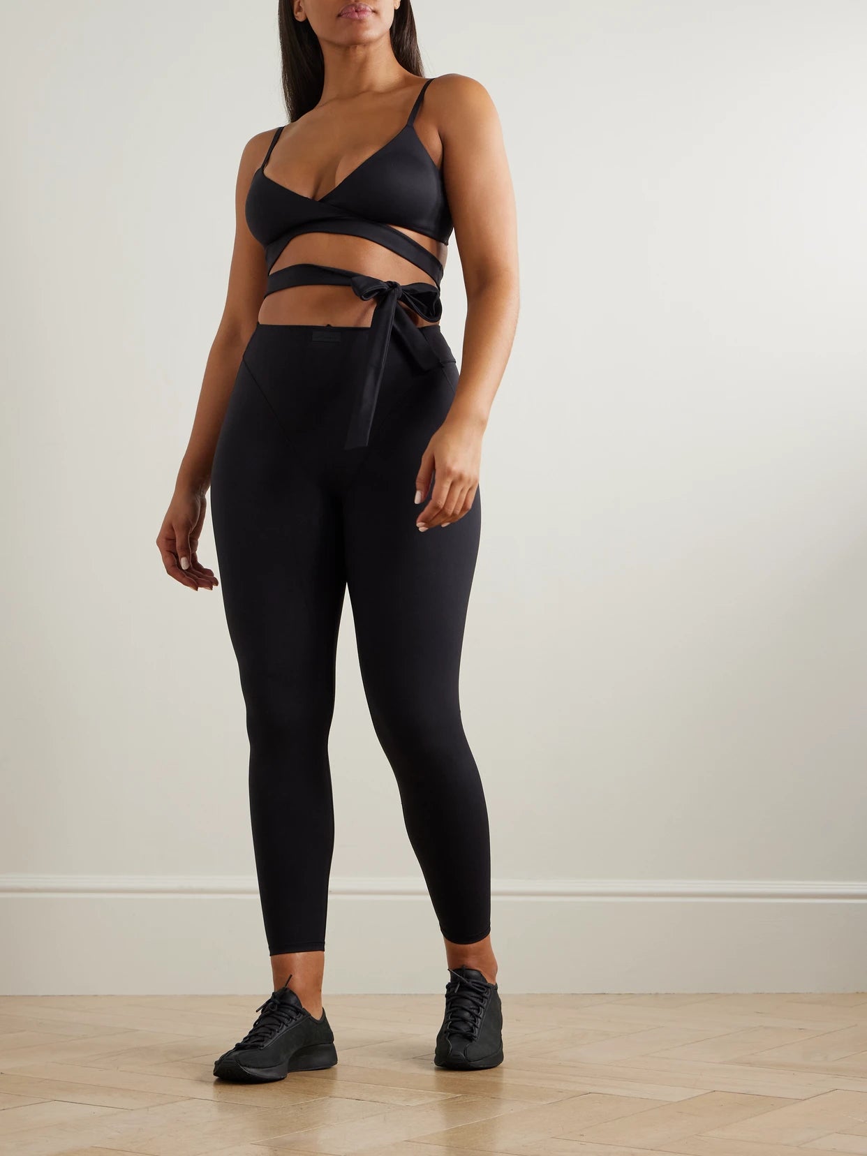 Image of Sleepwear & Loungewear. Product name - + Nike Wrap Front Bra - Obsidian in Black colour by brand - SKIMS