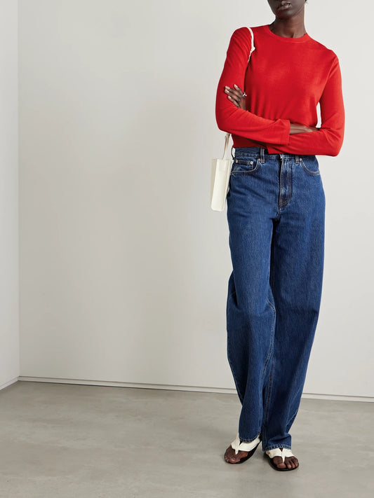 Image of a model wearing Outerwear. Product name - James Wool Sweater in Red colour by brand - LESET