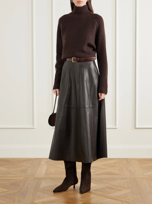 Image of a model wearing Outerwear. Product name - Tilly Cashmere Turtleneck Sweater in Brown colour by brand - Joseph