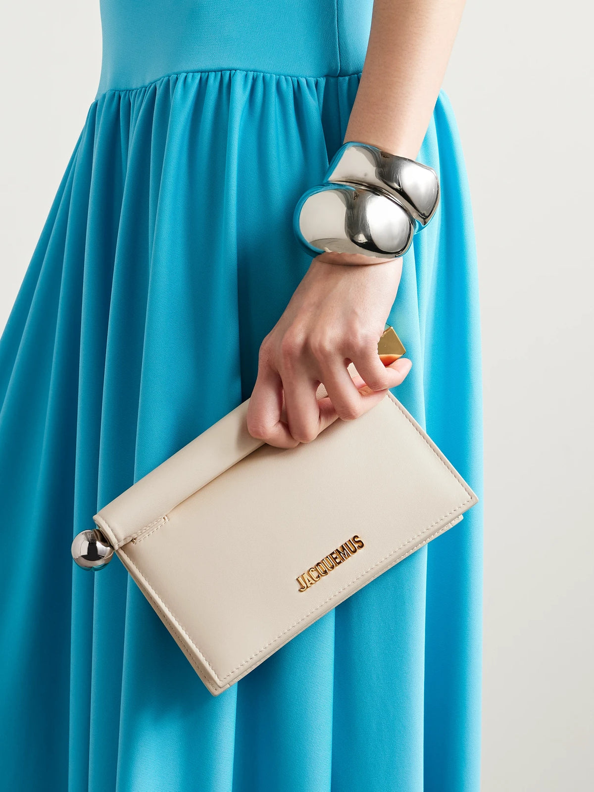 Image of Bags. Product name - Pochette Small Embellished Leather Clutch in Ivory colour by brand - Jacquemus