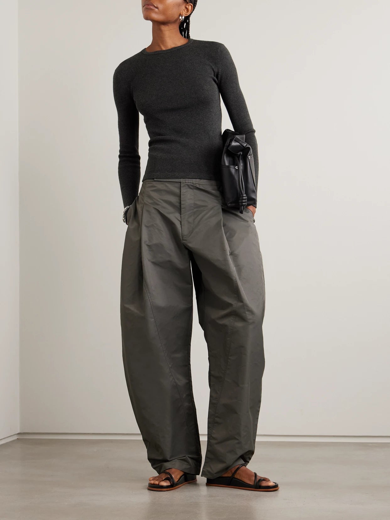 Image of a model wearing Outerwear. Product name - Vivian Ribbed Cotton And Cashmere-blend T-shirt in Charcoal colour by brand - LISA YANG
