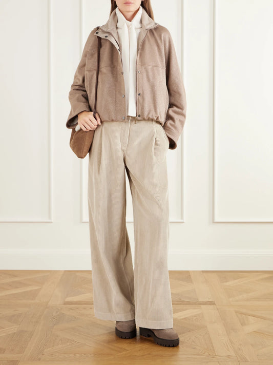 Image of a model wearing Outerwear. Product name - Cashmere Mock-neck Sweater in White colour by brand - Brunello Cucinelli
