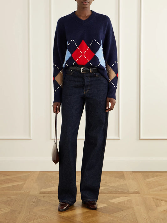 Image of a model wearing Outerwear. Product name - Sloane Embroidered Argyle Cashmere Sweater in Navy, Taupe colour by brand - Arch4